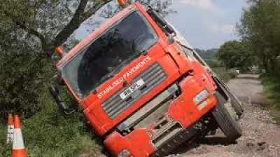 Somerset lorry left hanging after sinkhole swallows road repair work