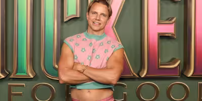 Courtney Act shares shirtless photos and drag video in new post
