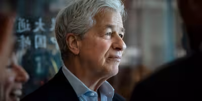 Jamie Dimon echoes Alan Greenspan with warning on AI market exuberance