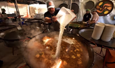 Bottlerock food prep starts early as Gerard Nebesky readies paella