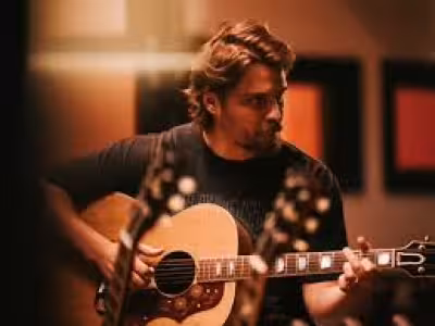 Luke Grimes recalls the outlaw country pilot that sparked his music path