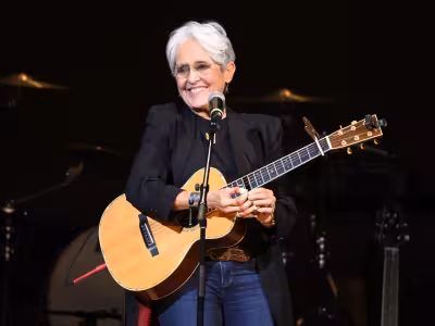 Joan Baez says pop stars should speak up, points to younger artists