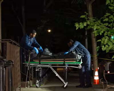Two women found stabbed dead in Slope apartment building with grim past