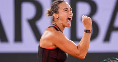 Shnaider storms back to force deciding set against Sabalenka