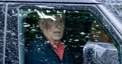 Prince Andrew seen with red mark on face while driving near Sandringham