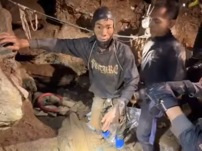 Laos Cave Rescue stopped as unstable entrance halts search for two men