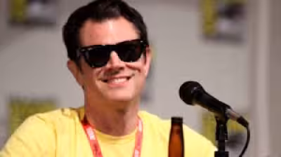 Johnny Knoxville rides with Jackass crew at West Hollywood Pride Parade