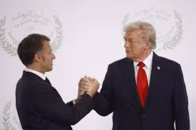 Versailles dinner puts Macron’s Trump diplomacy under fire