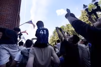 Zaire Emery fans wait hours as France leaves Boston hotel at 1:15 p.m.