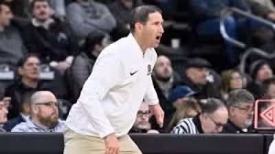 College Basketball: Michigan hires Brown coach Mike Martin to staff