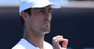 Bernard Tomic wins Lincoln Challenger after saving championship point