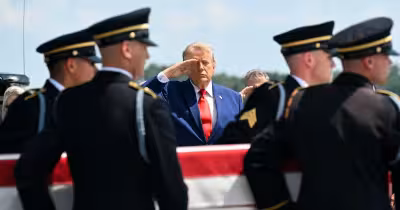 Trump attends dignified transfer at Dover Air Force Base for four fallen troops