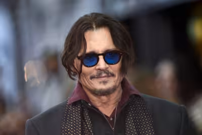 Johnny Depp revealed as Ebenezer Scrooge in first look at new film