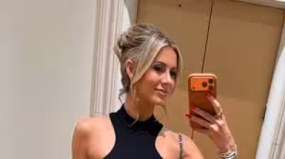 Laura Rutledge turns heads in black swimsuit photo as football season nears