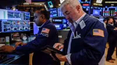 Slide in stocks as oil climbs and Walmart drops after profit report