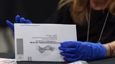 Justices' Views On Mail-in Voting Tested in Postal Service Appeal
