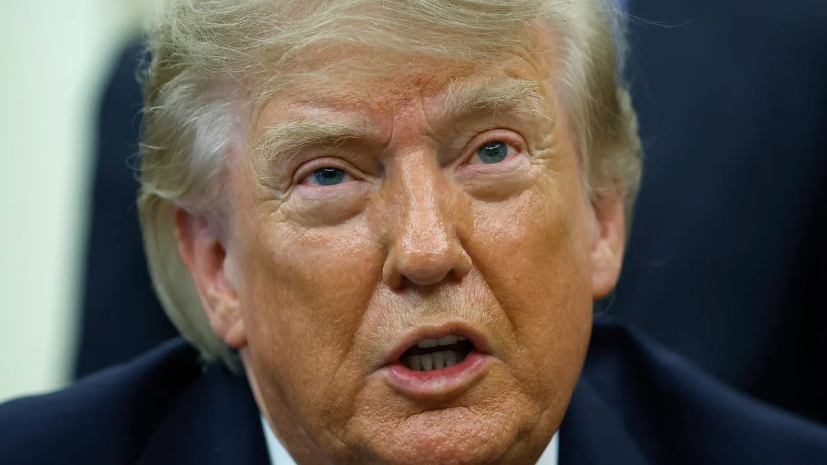 Donald Trump arriving in New Jersey with his new darker hair colour, captured in a wide news photograph