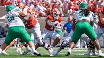 Howard Football page shows Adobe Flash Player prompt for virtual tour access