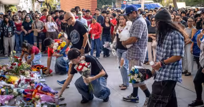 Hundreds gather for vigil after Benjamin Franklin High School student dies