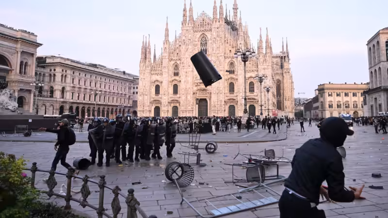 Milan clashes over cost of living spill into cathedral square
