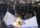 متدينون يهود يمزقون أعلام إسرائيل قبل احتفالات يوم الذكرى